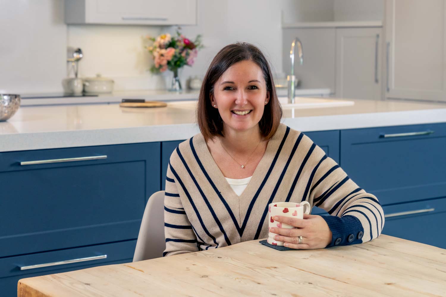Laura Barker - Associate of Connection Heroes - enjoying a cup of coffee.